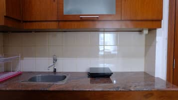 Apartment | Private kitchen | Full-size fridge, stovetop