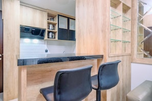 Departamento | Cocina privada | Refrigerador con congelador y parrilla de estufa 