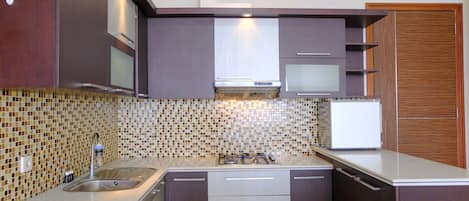 Appartamento | Cucina privata | Frigorifero con congelatore, piano cottura