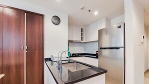 Apartment | Private kitchen - Great Designed And Homey 2Br At Branz Bsd City Apartment (Pagedangan)