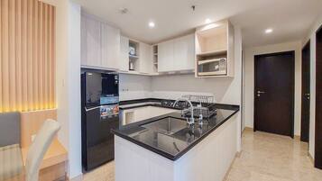Apartment | Private kitchen | Full-size fridge, stovetop