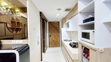 Apartment | Private kitchen | Full-sized fridge, stovetop