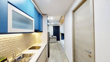 Estudio | Cocina privada | Refrigerador con congelador y parrilla de estufa