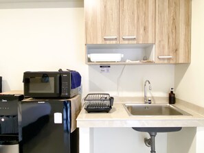 Studio | Private kitchen | Full-sized fridge, stovetop - Best Choice And Tidy Studio Meikarta Apartment (Cikarang)