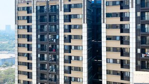 A high-rise building with multiple balconies and a modern architectural design. - Best Choice And Tidy Studio Meikarta Apartment (Cikarang)