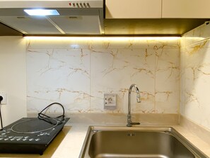 Apartment | Private kitchen | Full-sized fridge, stovetop - Spacious And Homey 2Br At Meikarta Apartment (Cikarang)