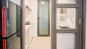 Apartment | Private kitchen | Fridge - Wonderful And Homey 3Br Sky House Bsd Apartment (Pagedangan)