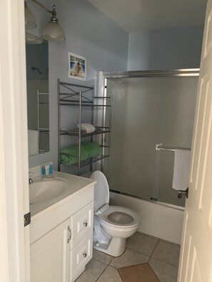 Hair dryer, towels, soap, shampoo