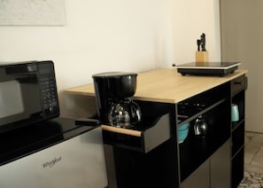 Microwave, coffee/tea maker, toaster, cookware/dishes/utensils