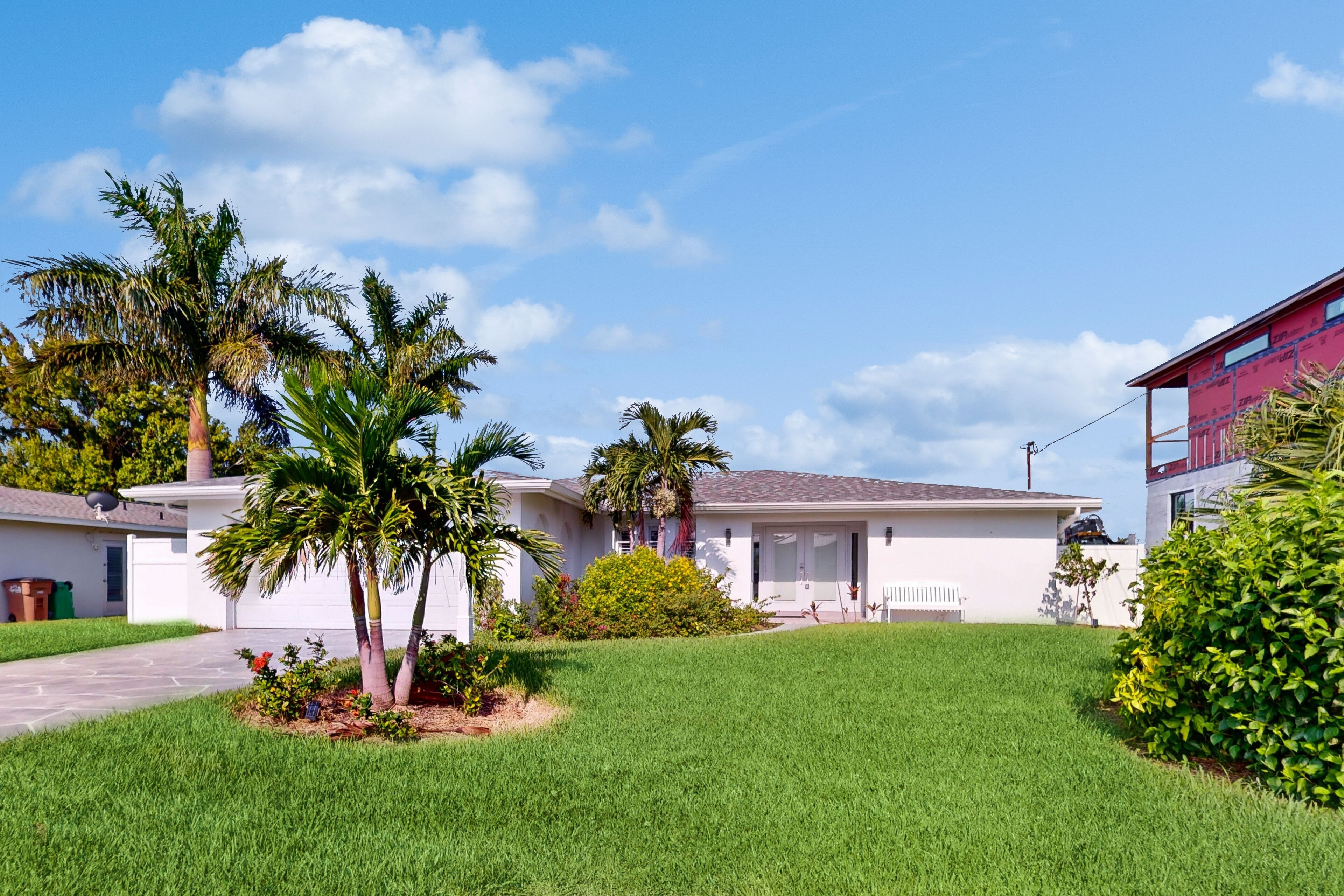 Dog-friendly canal-front home with private pool, dock, lanai, W/D
