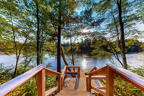 New dog-friendly cabin with river views, grill, modern interior, W/D, and AC