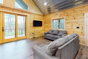 TV - New dog-friendly cabin with river views, grill, modern interior, W/D, and AC (Tomahawk)