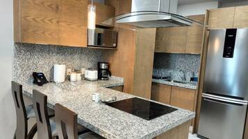 Apartment | Private kitchen | Full-sized fridge, microwave, stovetop, blender