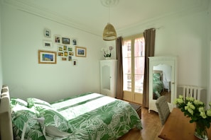 1 bedroom, desk, iron/ironing board, travel crib