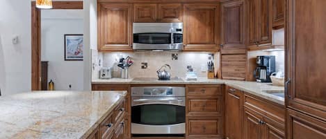 Microwave, stovetop, dishwasher, coffee/tea maker