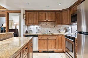 Microwave, stovetop, dishwasher, coffee/tea maker