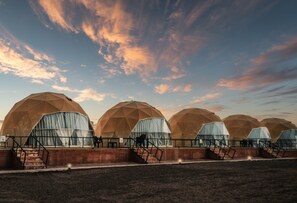 Unique geodesic domes offer entrances and upper-level access.