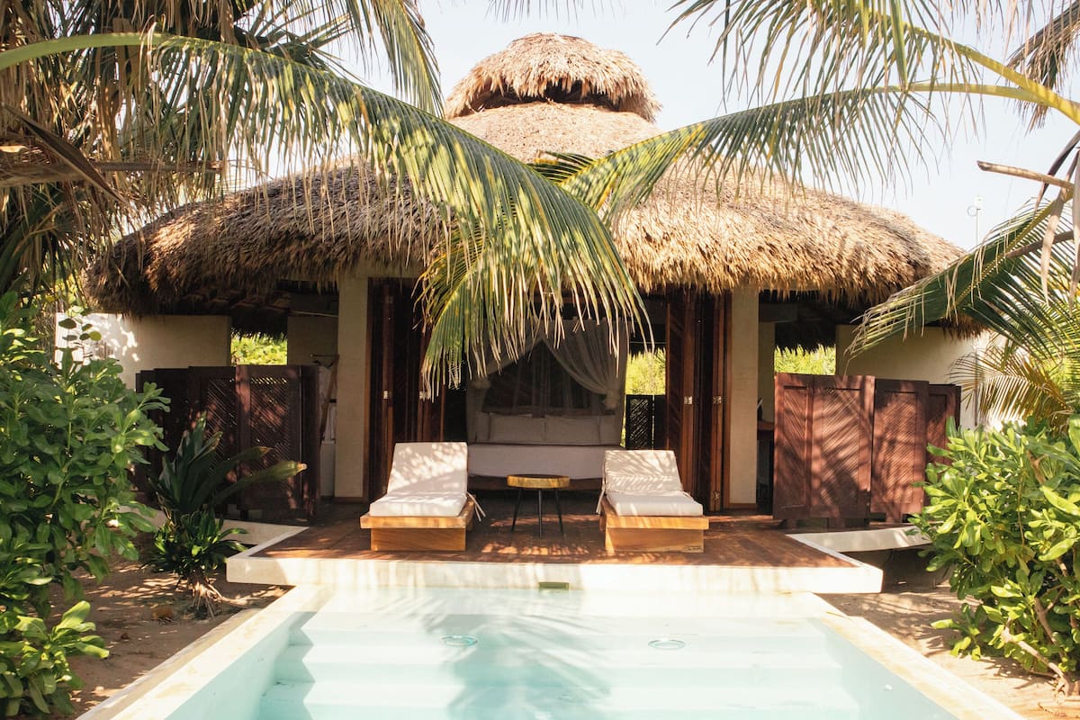 Cabaña panorámica | Minibar, caja de seguridad en la habitación y decoración personalizada