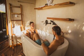 Combined shower/tub, rainfall showerhead, bathrobes, towels