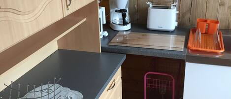 Fridge, microwave, coffee/tea maker, toaster