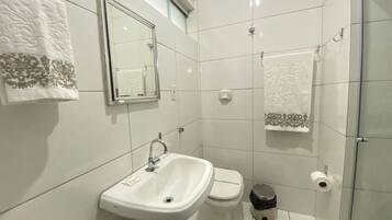 Shower, towels, toilet paper