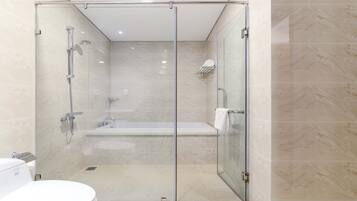 Deluxe Apartment, 2 Bedrooms, Bathtub, City View | Bathroom | Hydromassage showerhead, designer toiletries, hair dryer, slippers