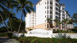 A multi-story hotel with a sign reading "Marriott Vacation Club Ocean Pointe." - Beautiful Marriott Ocean Point Resort - Studio Villa - on the beach. (Palm Beach Shores)