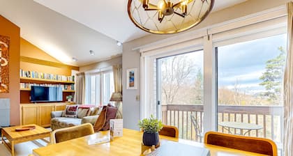 Ski-in/out condo steps from the lifts/village with fireplace & mountain views