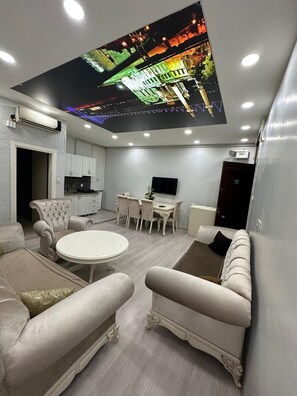 Luxury Apartment | Living area | 72-cm plasma TV with cable channels - Suit Travel (Istanbul)