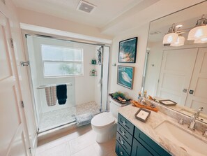Shower, hair dryer, towels, soap