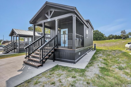 Exterior. Cottage with Loft - Pet Friendly - Includes 3 queen beds (one in master and 2 in loft), a fully equipped kitchen, dining area, private bath and shower, TVs, Wifi, all utilities, access to all resort amenities. This cottage is pet friendly.