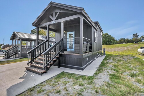 Cottage with Loft - Pet Friendly - Includes 3 queen beds (one in master and 2 in loft), a fully equipped kitchen, dining area, private bath and shower, TVs, Wifi, all utilities, access to all resort amenities. This cottage is pet friendly.