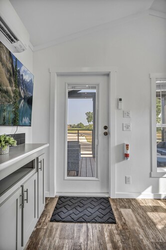 Cottage with Bunk Beds - Includes 1 queen bed in the master, 2 bunk beds and 1 queen bed in the loft. A fully equipped kitchen, dining area, private bath and shower, TVs, Wifi, all utilities, access to all resort amenities. This cottage is pet friend