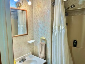 Hair dryer, towels, soap, shampoo