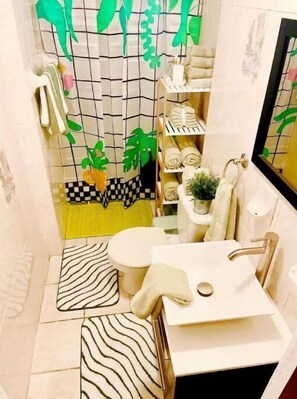 Shower, hair dryer, towels, soap