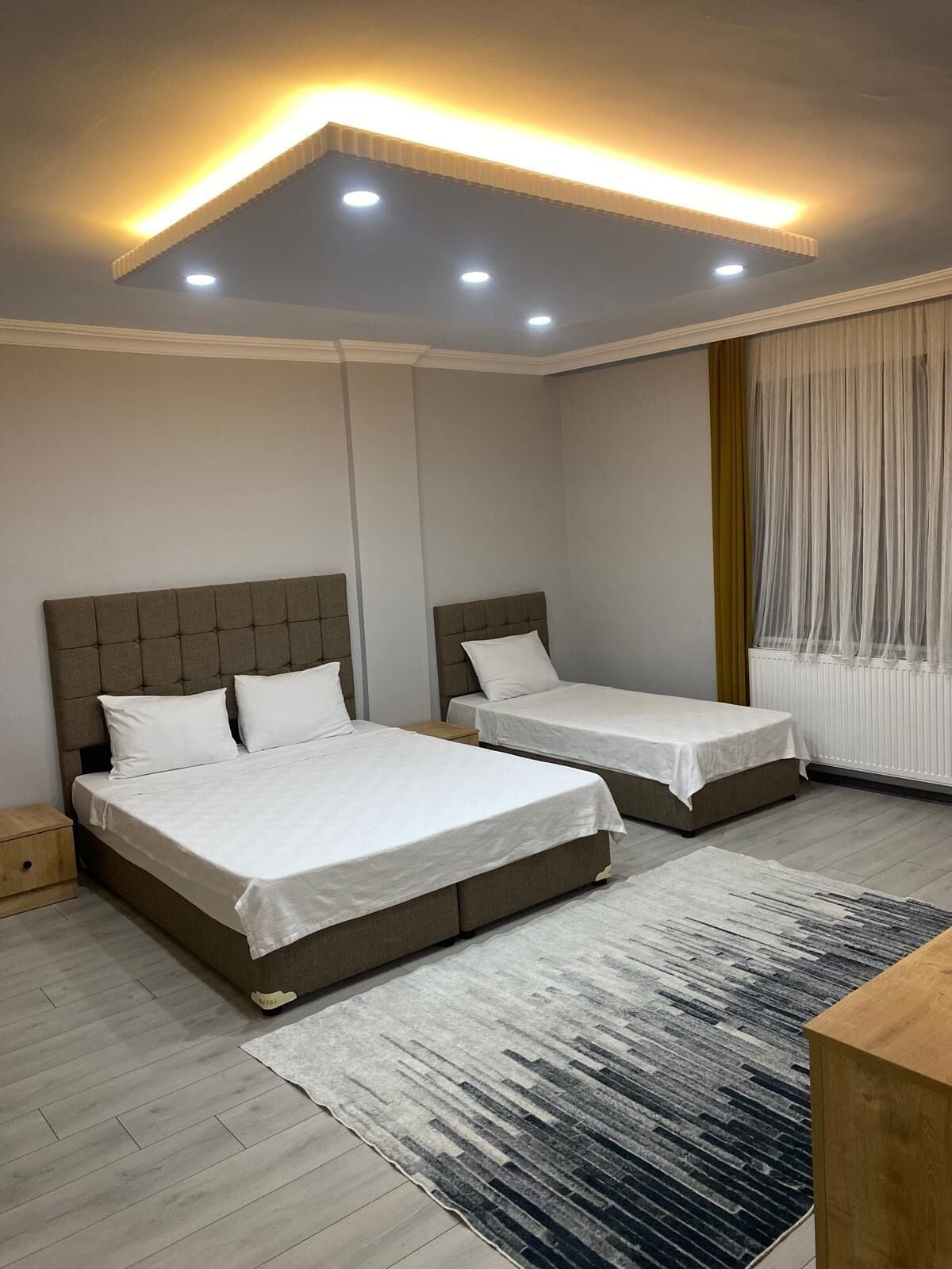 Family Apartment, Multiple Beds, Non Smoking, City View | Premium bedding, free minibar, desk, laptop workspace