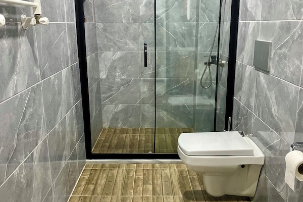 Superior Apartment, 1 Queen Bed with Sofa bed, Non Smoking, City View | Bathroom | Shower, rainfall showerhead, free toiletries, hair dryer