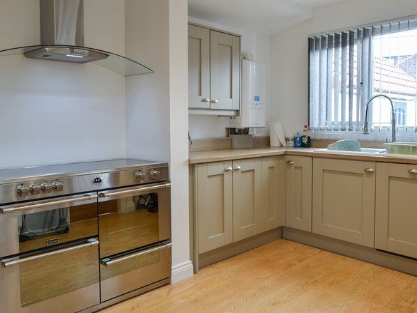 Dishwasher, high chair, cookware/dishes/utensils