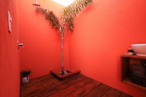 Shower, rainfall showerhead, towels, soap