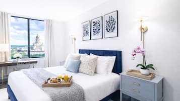 1 bedroom, desk, iron/ironing board, travel crib