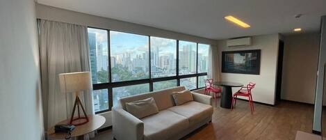 Apartment | Living area | 43-inch Smart TV with cable channels