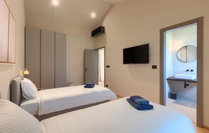 3 Schlafzimmer, Zimmersafe, Bügeleisen/Bügelbrett, Reisekinderbett