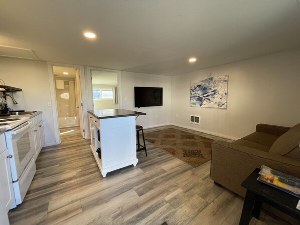 Suite, 1 chambre | Coin séjour