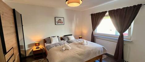 2 bedrooms, in-room safe, iron/ironing board, travel crib