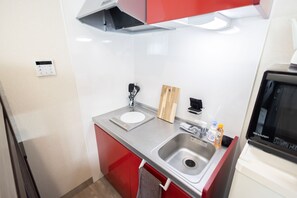 Fridge, microwave, stovetop, coffee/tea maker