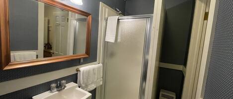 Shower, hair dryer, towels, soap