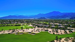 Experience golfing amidst a serene desert landscape with well-maintained fairways and greens.
