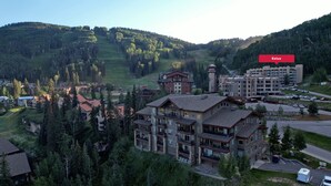 A resort with multiple buildings, including a large lodge with balconies and a smaller building with a tower. - Eolus 626 - Managed by Purgatory Resort (Durango)