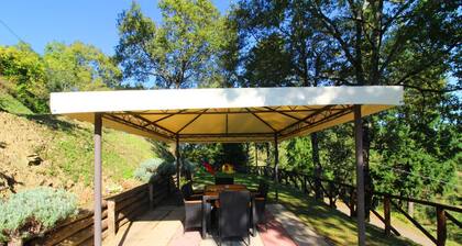 Part of an old stone country house enjoying a splendid panoramic view over the woods of the Casentin