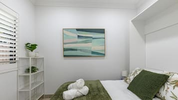 2 bedrooms, desk, iron/ironing board, travel crib